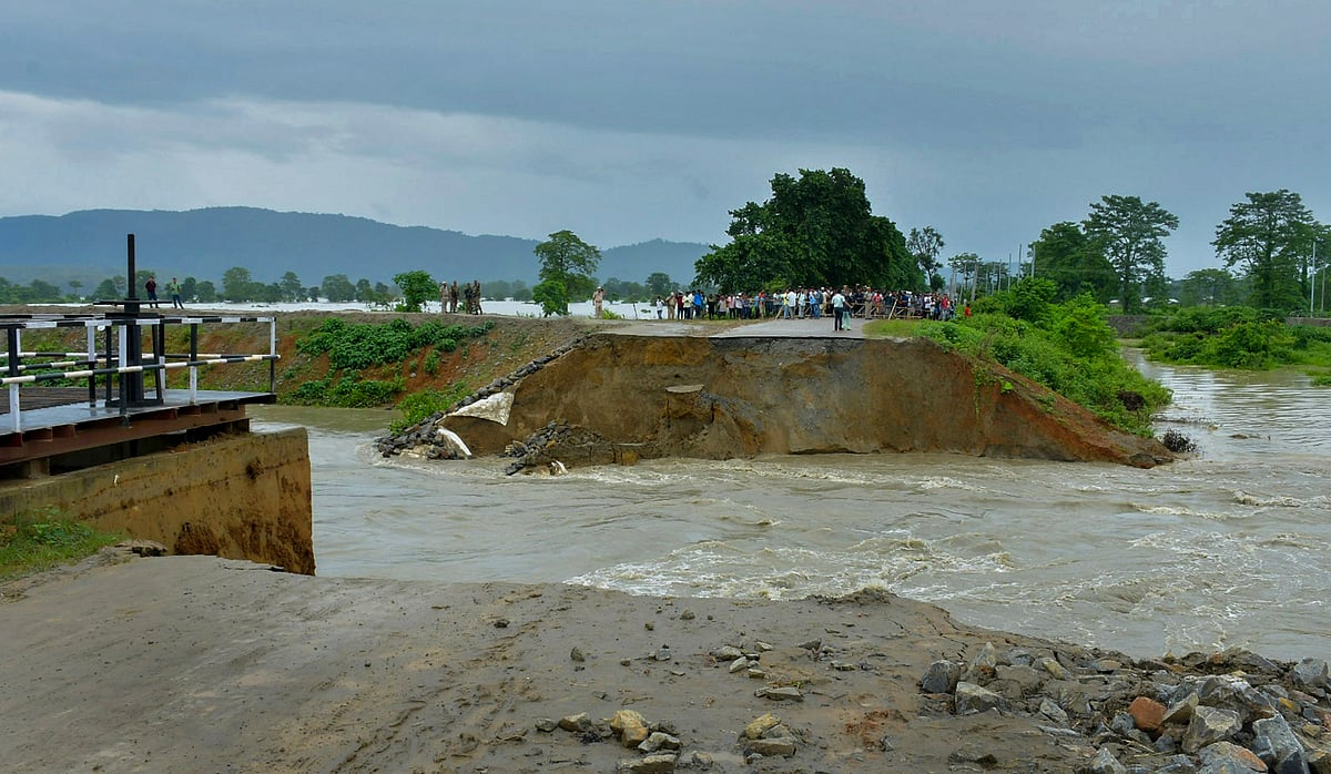 Assam Floods: Body of boy who fell into drain recovered - | Photo: PTI 